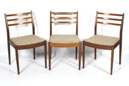 Three 1960s G-Plan teak chairs dining chairs.