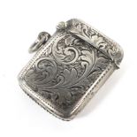 A small silver Vesta case engraved with leaves.