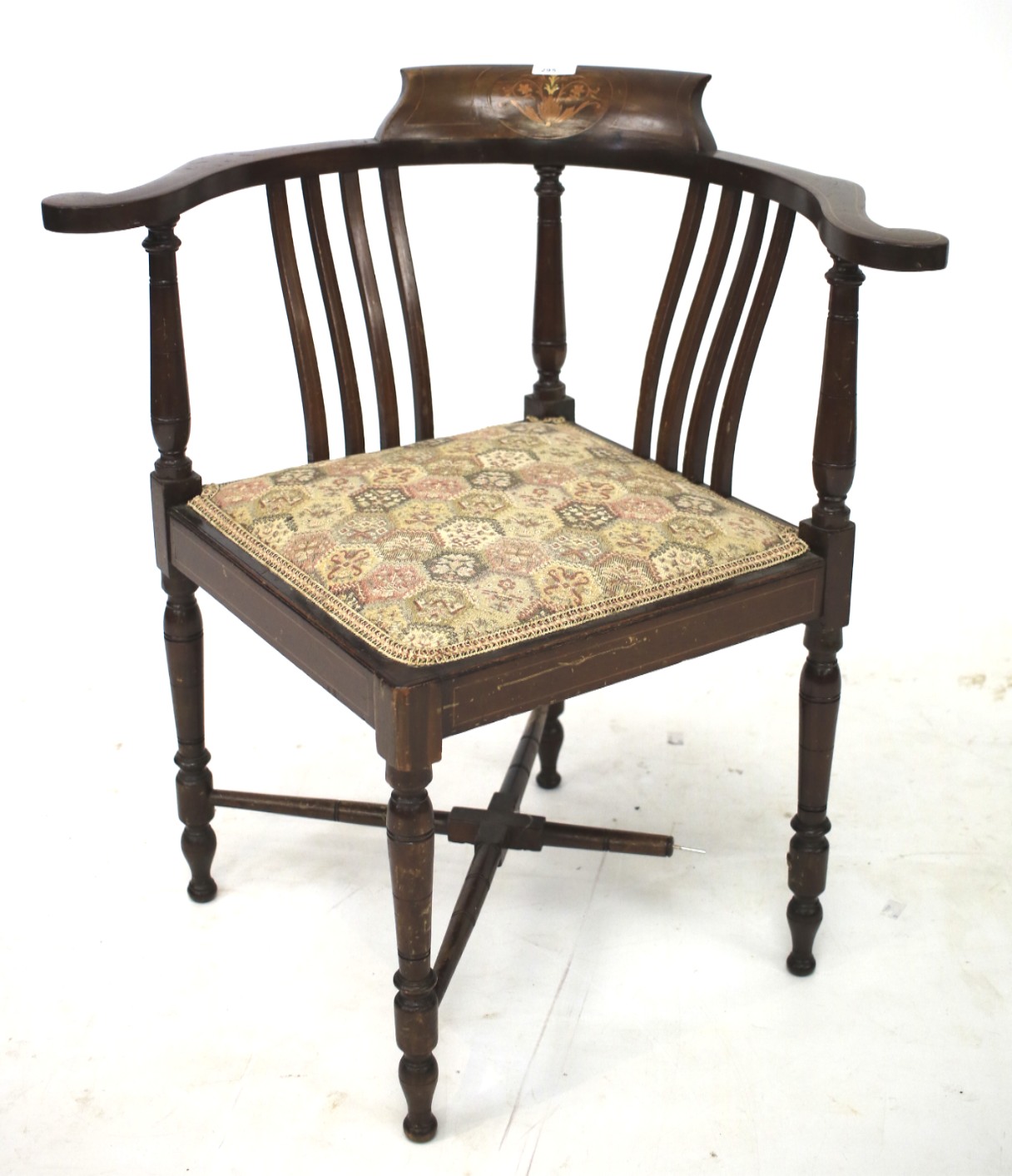A Regency style mahogany corner chair.