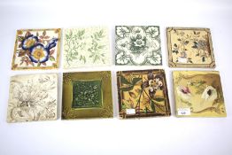 Eight late 19th century pottery tiles, including Minton examples.