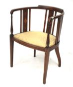 An Edwardian satin wood inlaid mahogany tub chair.