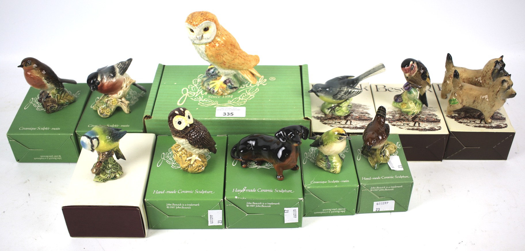 A collection of boxed Beswick models of animals.