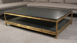 A large contemporary coffee table.