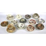 A collection of 19th century English pottery and porcelain trios and teacups and saucers.