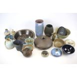 An assortment of British and Continental studio pottery. Glazed in shades of brown, green and blue.
