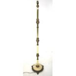 A mid-20th century brass standard lamp. With raised laurel swag details.