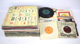 A collection of assorted vinyl records.