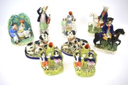 Various Staffordshire pottery figures and other reproduction figures and groups.