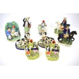 Various Staffordshire pottery figures and other reproduction figures and groups.