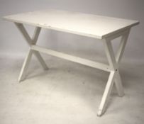 A modern X-frame white table.