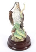 A contemporary limited edition Coalport ceramic figure of a woodcock.