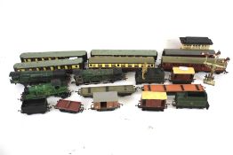 A box of 00 gauge trains and track.