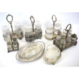 Three pickle jar sets, two condiment sets and other glass serving dishes.