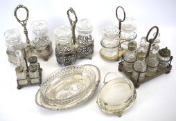 Three pickle jar sets, two condiment sets and other glass serving dishes.