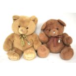 Two large teddy bears. In beige and strawberry-brown.