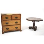 An early 20th century apprentice piece tilt top table and veneered chest of drawers. The chest L19.
