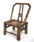 An unusual vintage bamboo child's chair.