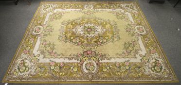 A large beige and lime green ground rug with green and pink flowers.