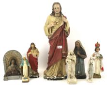 Eight British and continental painted plaster religious figures.