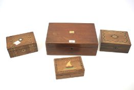 A collection of inlaid boxes.