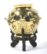 A 20th century Chinese gilt bronze vase on stand.