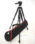 A Manfrotto camera tripod in carry case.