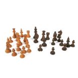 An early 20th century carved wooden chess set.