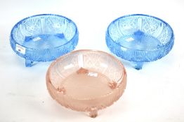 Three Art Deco style press-moulded coloured glass fruit bowls.