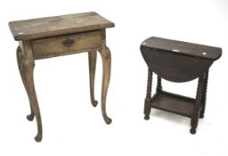 A small, early 20th century oak drop leaf table and a side table.