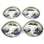 Four 18th/19th century Japanese Imari shell shaped dishes. With gilt landscape decoration.