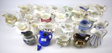 A collection of 19th/early 20th century century English pottery and porcelain jugs.