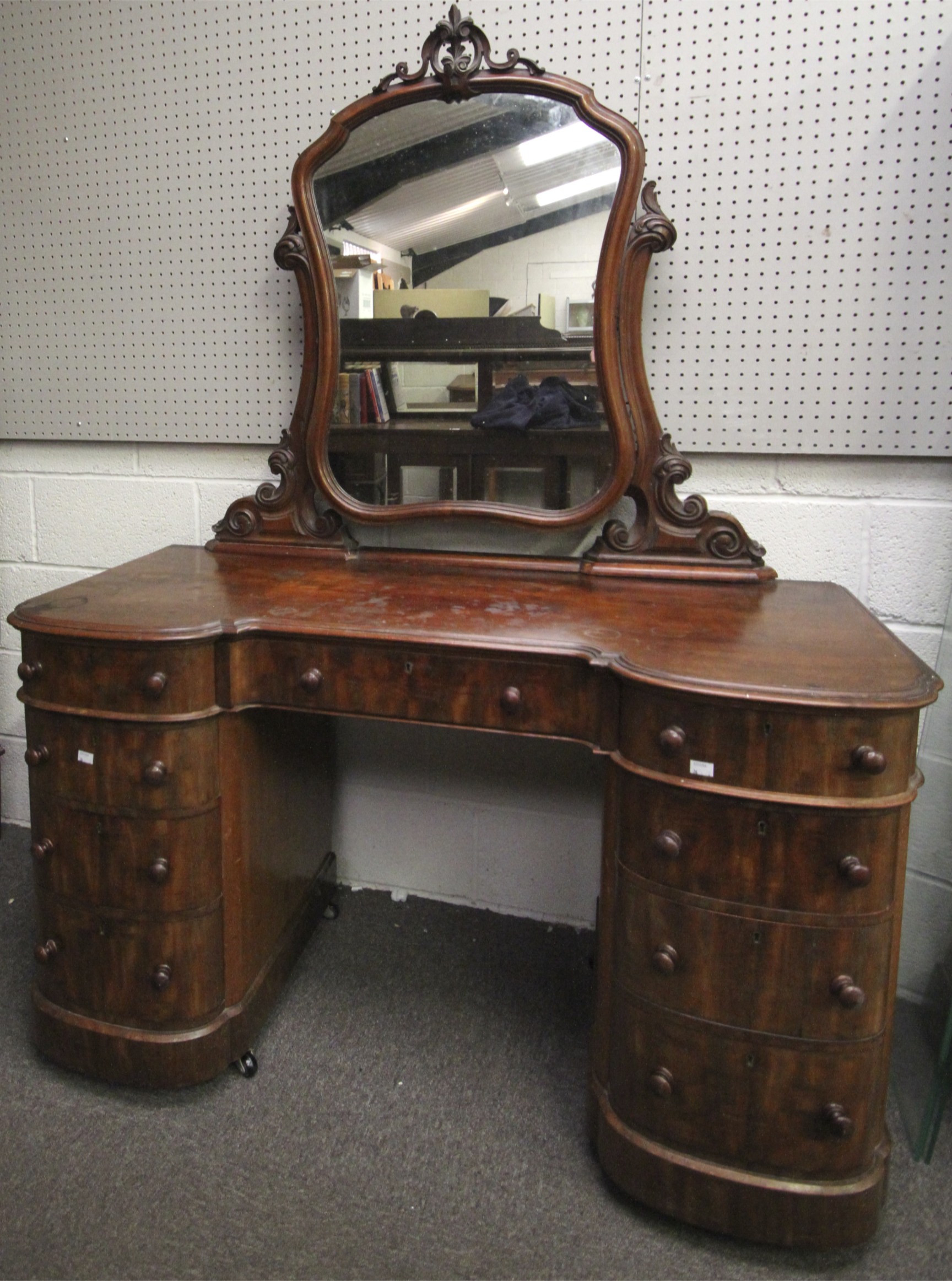 A Victorian mahogany pedestal dressing table.