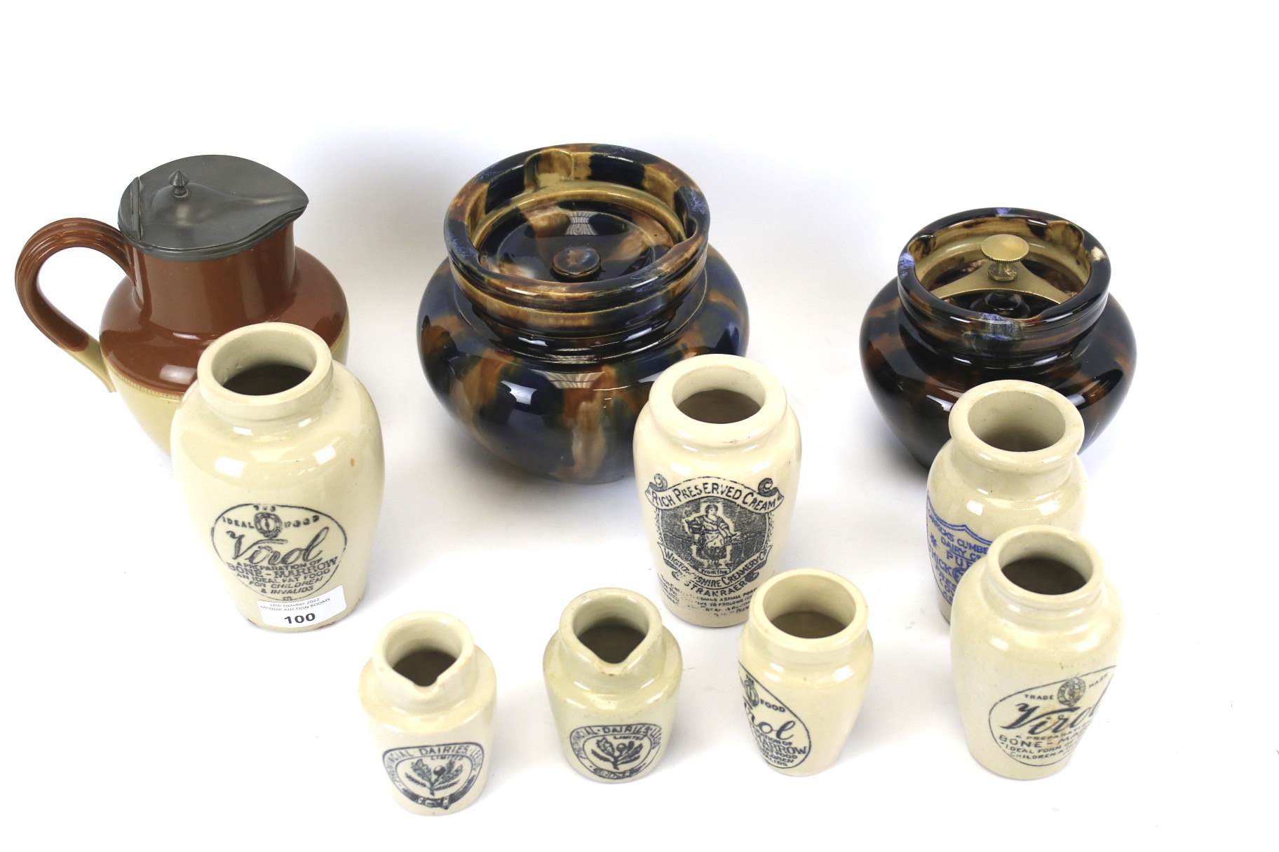 Various stoneware preserve pots in sizes.