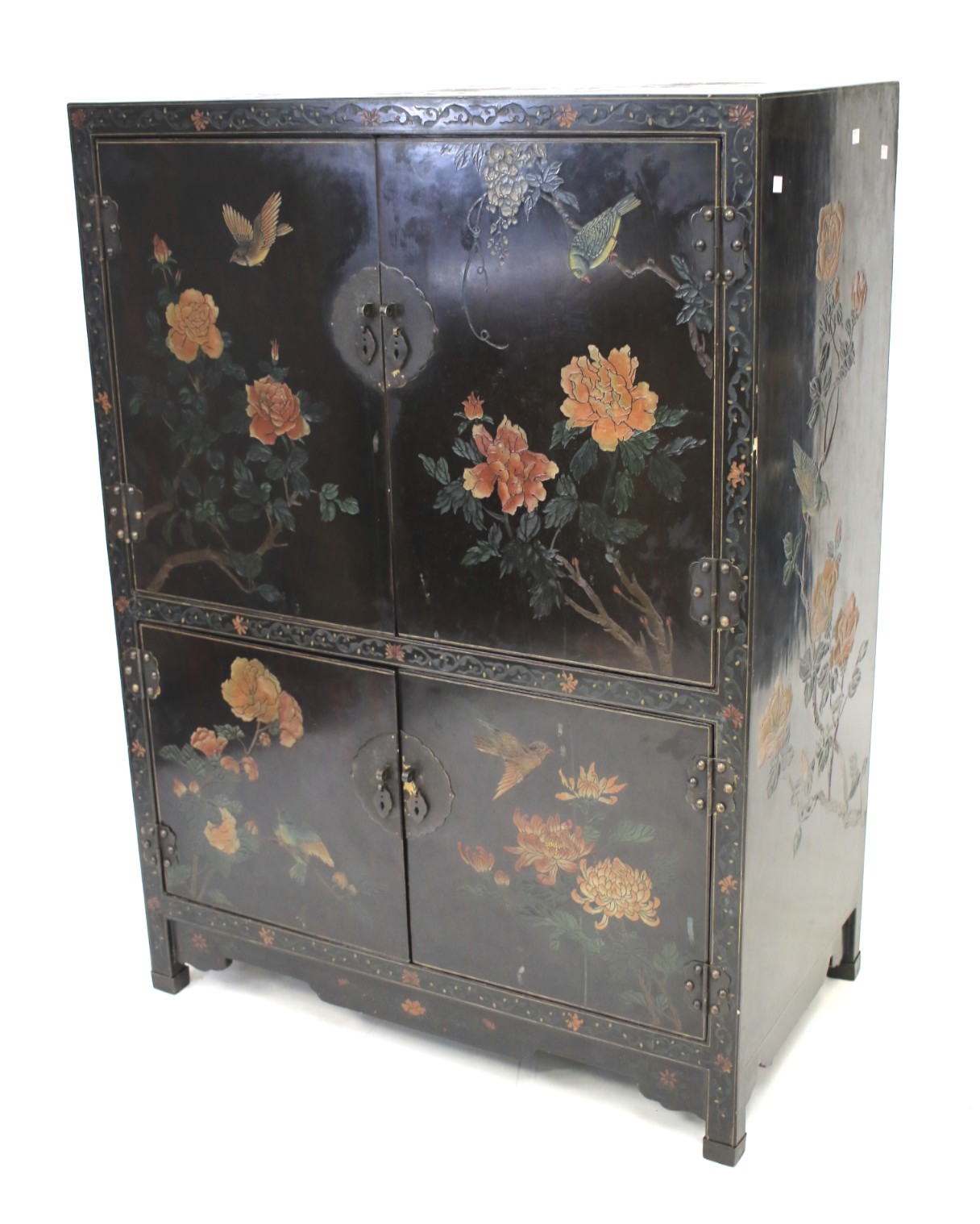 A lacquered Chinese style cabinet with upper and lower cupboard.
