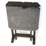 A square tilt-top table carved with a Chinese landscape scene to the top. With glass cover.