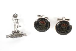 A pair of George VI 1948 enamelled halfpenny cufflinks and a silver and marcasite Mercury badge.