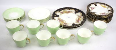 A Wedgwood part teaset and other plates.