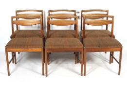 A set of six mid-century Danish style teak dining chairs.
