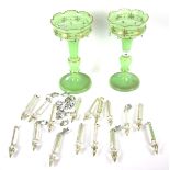 A pair of Victorian green glass lustres.