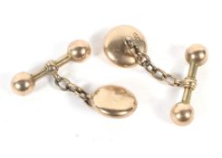 A pair of 10ct rose gold cuff links with ball T bar. Weight 5.