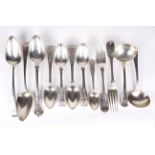 Twelve assorted pieces of silver flatware. Including ladles, forks, spoons, serving spoons etc.