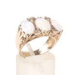A vintage 9ct gold, opal and diamond carved half-hoop ring.