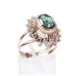 A vintage green synthetic spinel single stone ring.