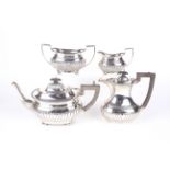 An Edwardian silver tea set.