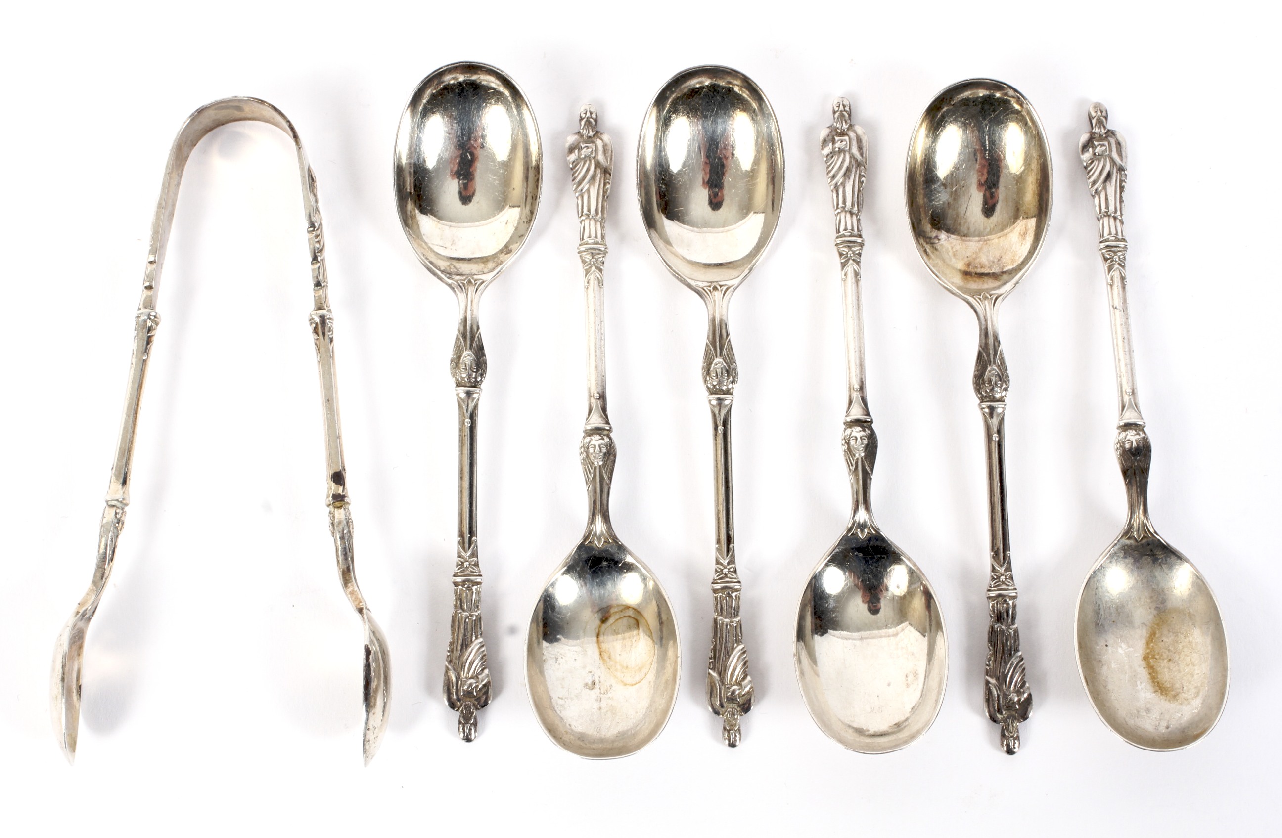 A set of six silver apostle spoons and matching tongs. Maker Atkins Brothers Sheffield 1911.