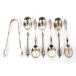 A set of six silver apostle spoons and matching tongs. Maker Atkins Brothers Sheffield 1911.
