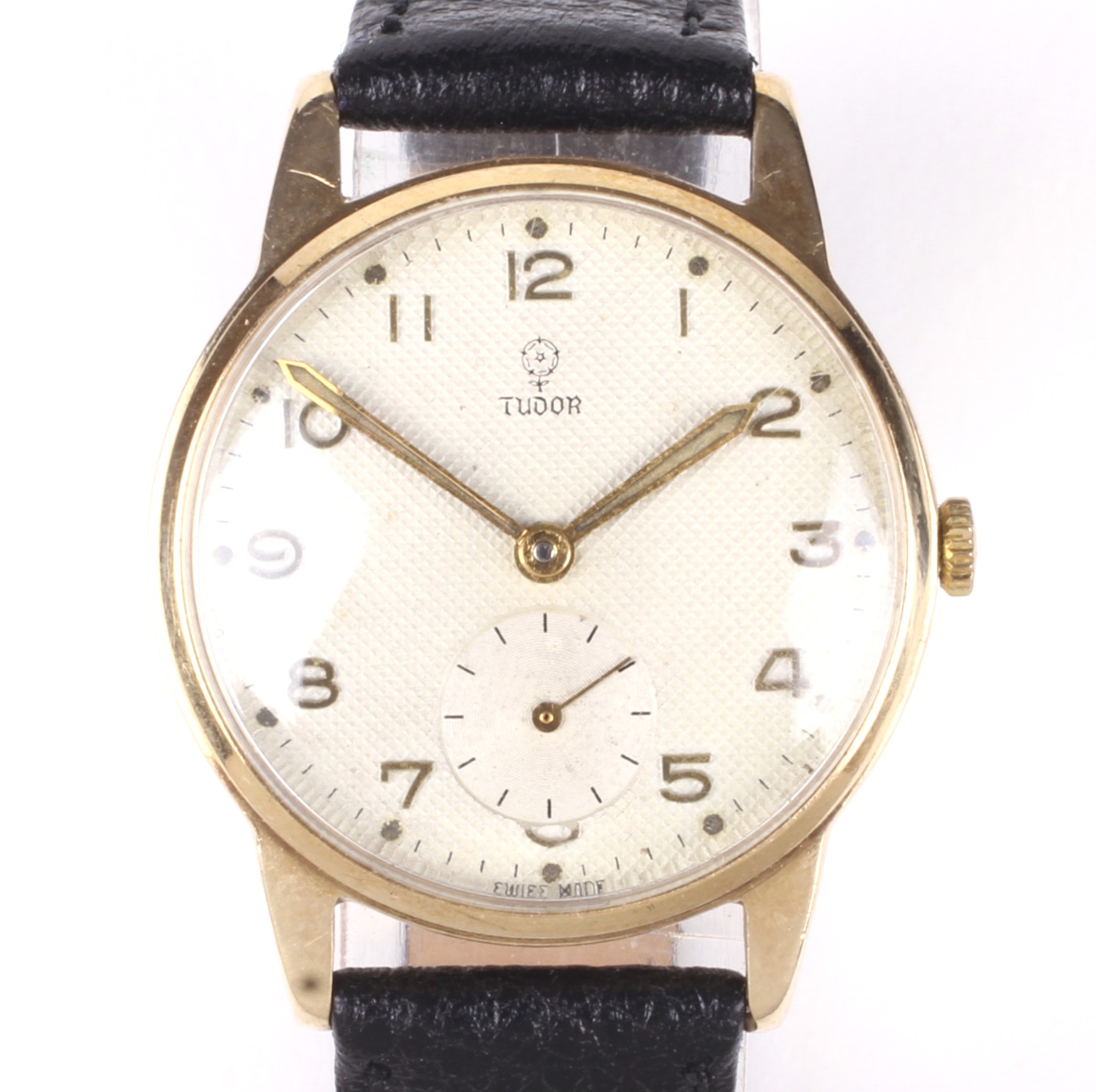 A 1950s 9ct gold cased manual wind Tudor wristwatch.