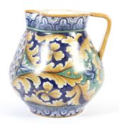 An early 20th century large Italian majolica jug.