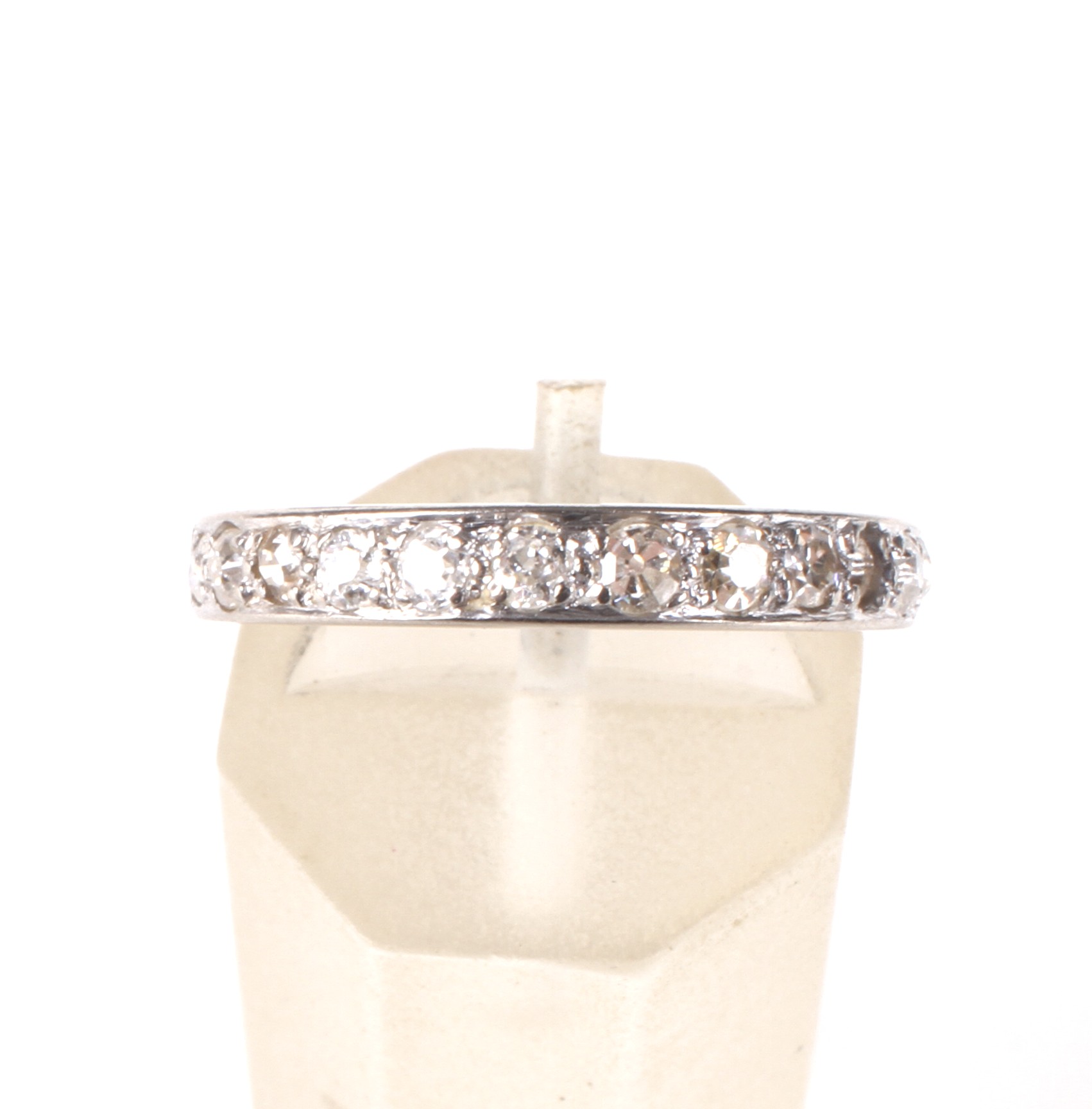 A mid 20th century gold and diamond half-eternity ring. - Image 2 of 5