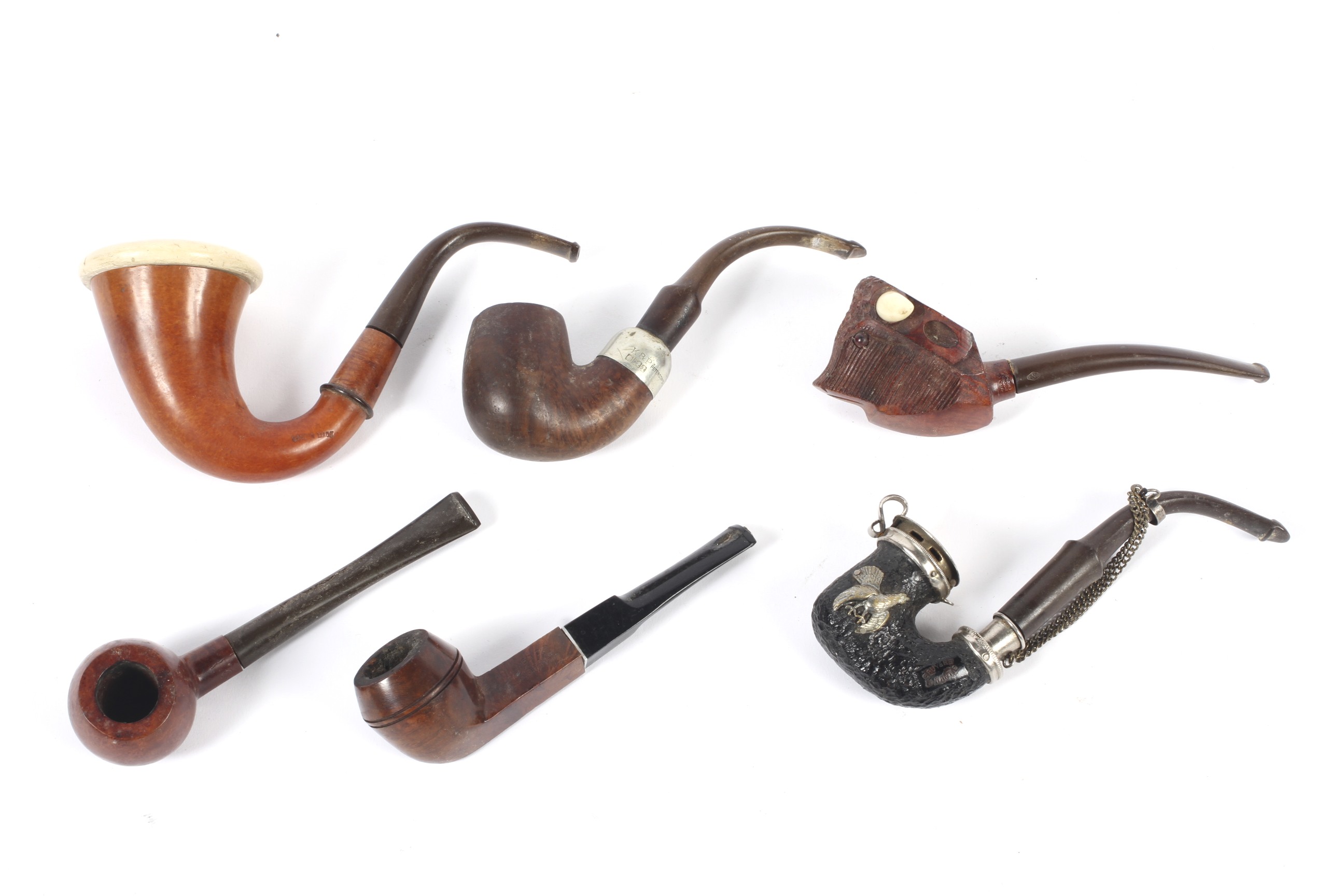 A collection of six pipes.